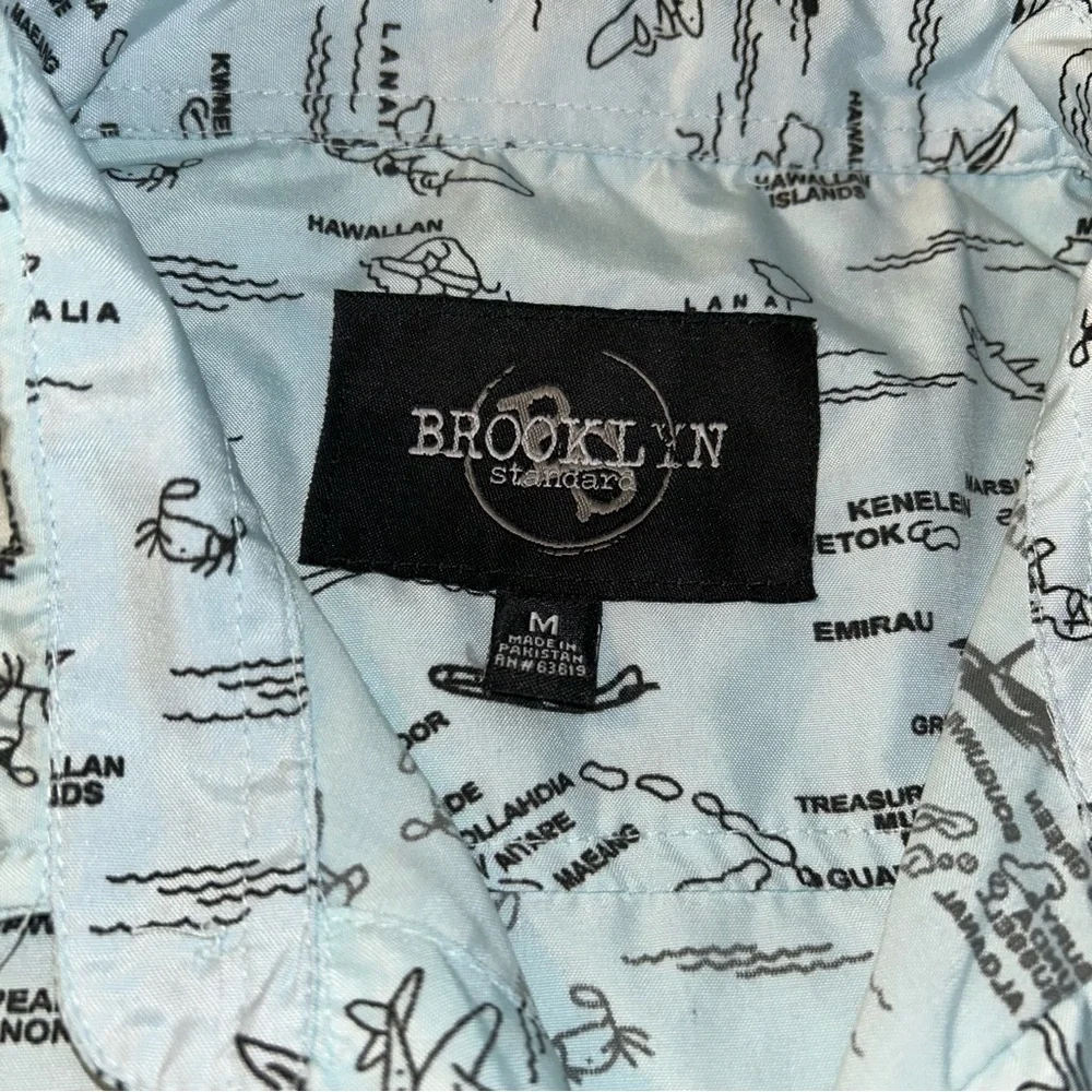 Brooklyn Standard blue with islands and planes short sleeve button down size M